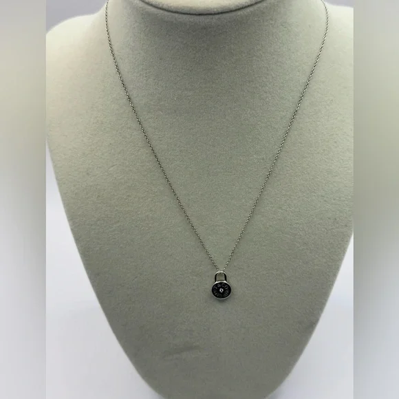 Tiffany & Co. Round Lock Sterling Silver & Diamond Pendant